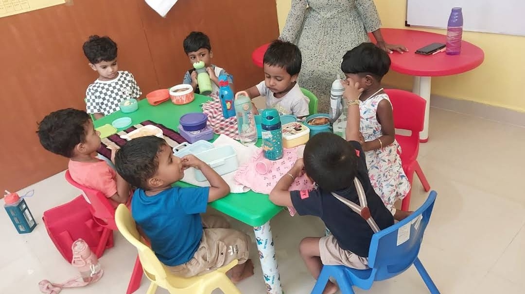 Children enjoying lunch together